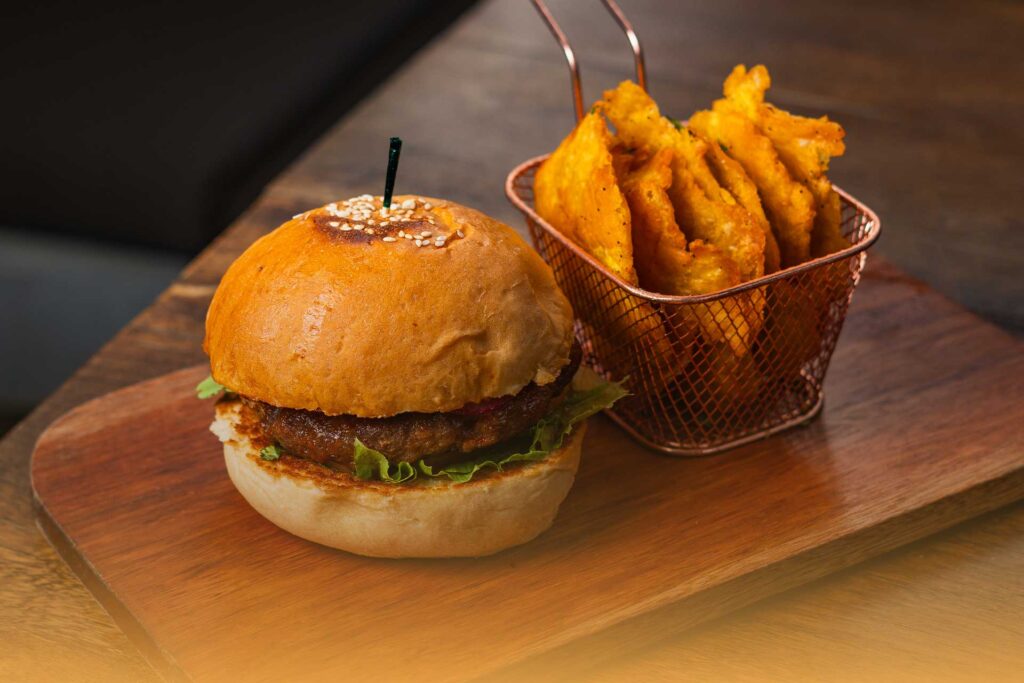 Crispy Chicken Burger at The Hive Lounge: A Must-Try Burger Experience in Belize - The Hive Lounge Crispy Chicken Burger at The Hive Lounge: A Must-Try Burger Experience in Belize